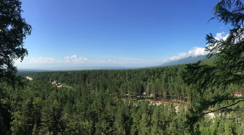 Panoramic view of the lush green forest and mountains in Arshan Tunka Valley, Buryatia