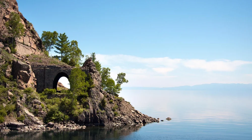 Historic stone tunnel of the Circum-Baikal Railway on the shore of Lake Baikal